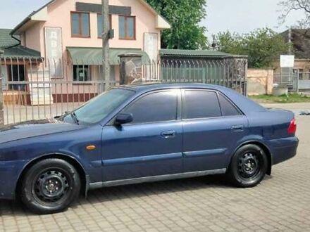 Синій Мазда 626, об'ємом двигуна 1.8 л та пробігом 197 тис. км за 2500 $, фото 1 на Automoto.ua