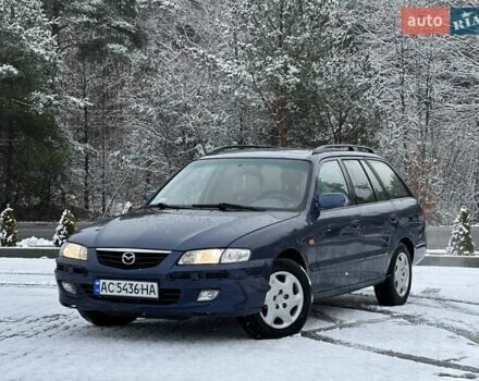 Синій Мазда 626, об'ємом двигуна 2 л та пробігом 294 тис. км за 1999 $, фото 1 на Automoto.ua