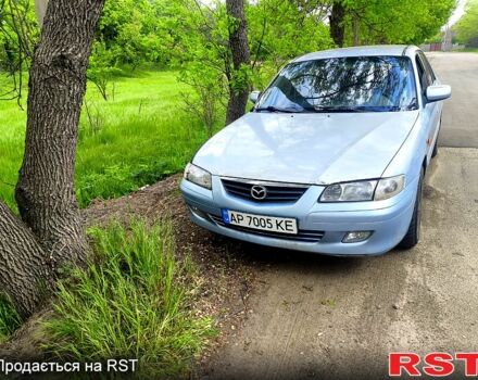 Синий Мазда 626, объемом двигателя 2 л и пробегом 400 тыс. км за 1800 $, фото 1 на Automoto.ua