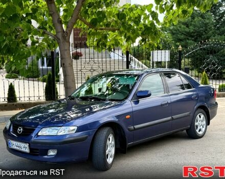 Синий Мазда 626, объемом двигателя 2 л и пробегом 250 тыс. км за 2650 $, фото 1 на Automoto.ua