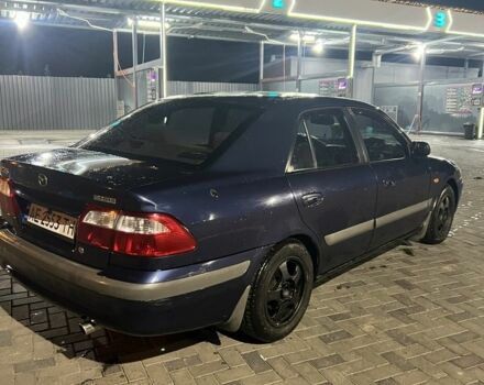 Синий Мазда 626, объемом двигателя 2 л и пробегом 315 тыс. км за 3300 $, фото 1 на Automoto.ua