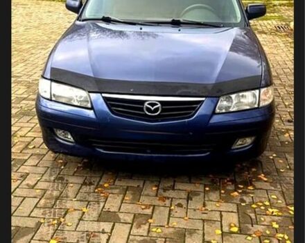 Синий Мазда 626, объемом двигателя 2 л и пробегом 250 тыс. км за 1700 $, фото 1 на Automoto.ua