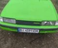 Зеленый Мазда 626, объемом двигателя 2 л и пробегом 120 тыс. км за 557 $, фото 1 на Automoto.ua