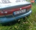 Зеленый Мазда 626, объемом двигателя 2 л и пробегом 300 тыс. км за 450 $, фото 1 на Automoto.ua