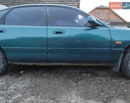 Зелений Мазда 626, об'ємом двигуна 2 л та пробігом 340 тис. км за 1650 $, фото 11 на Automoto.ua