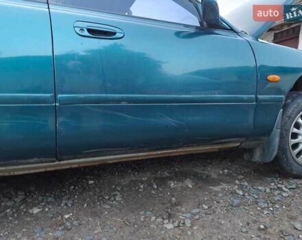 Зелений Мазда 626, об'ємом двигуна 2 л та пробігом 340 тис. км за 1650 $, фото 4 на Automoto.ua