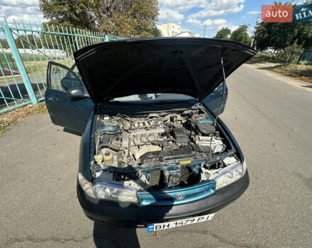 Зеленый Мазда 626, объемом двигателя 1.79 л и пробегом 432 тыс. км за 1700 $, фото 12 на Automoto.ua