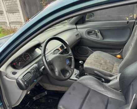 Зеленый Мазда 626, объемом двигателя 2 л и пробегом 3 тыс. км за 1500 $, фото 3 на Automoto.ua