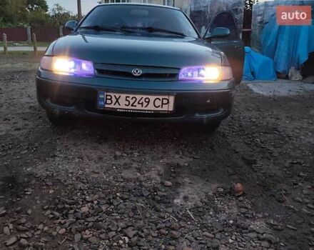 Зелений Мазда 626, об'ємом двигуна 2 л та пробігом 340 тис. км за 1650 $, фото 26 на Automoto.ua