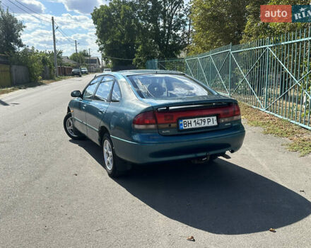 Зеленый Мазда 626, объемом двигателя 1.79 л и пробегом 432 тыс. км за 1700 $, фото 2 на Automoto.ua