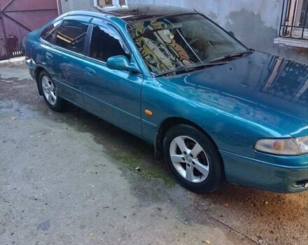 Зелений Мазда 626, об'ємом двигуна 1.79 л та пробігом 393 тис. км за 2300 $, фото 4 на Automoto.ua