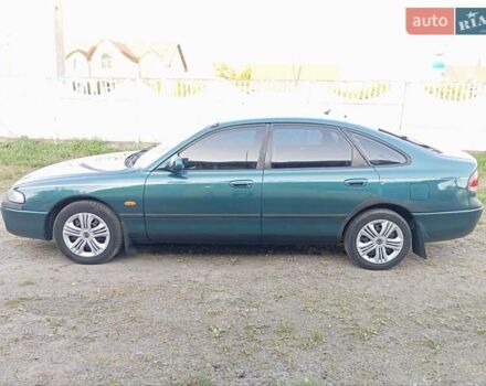 Зелений Мазда 626, об'ємом двигуна 2 л та пробігом 401 тис. км за 1550 $, фото 3 на Automoto.ua