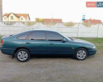 Зелений Мазда 626, об'ємом двигуна 2 л та пробігом 401 тис. км за 1550 $, фото 4 на Automoto.ua