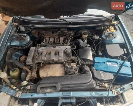 Зеленый Мазда 626, объемом двигателя 2 л и пробегом 250 тыс. км за 2100 $, фото 1 на Automoto.ua