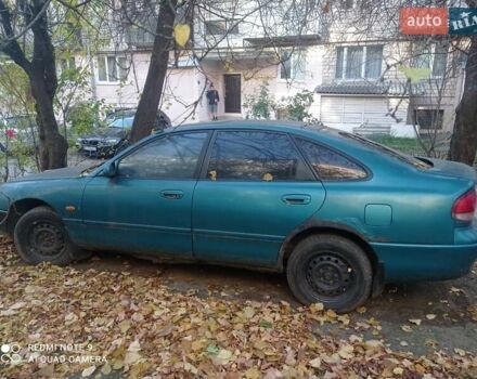 Зеленый Мазда 626, объемом двигателя 1.8 л и пробегом 400 тыс. км за 1200 $, фото 1 на Automoto.ua