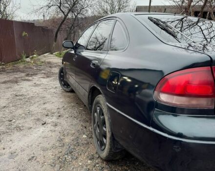 Зелений Мазда 626, об'ємом двигуна 2 л та пробігом 320 тис. км за 1500 $, фото 1 на Automoto.ua