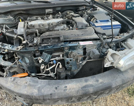 Зеленый Мазда 626, объемом двигателя 2 л и пробегом 256 тыс. км за 500 $, фото 2 на Automoto.ua