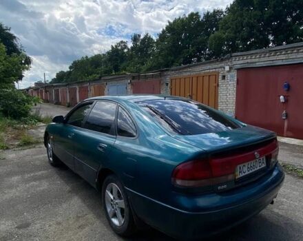 Зеленый Мазда 626, объемом двигателя 1.8 л и пробегом 350 тыс. км за 1070 $, фото 3 на Automoto.ua