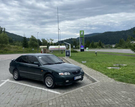 Зеленый Мазда 626, объемом двигателя 2 л и пробегом 282 тыс. км за 3500 $, фото 1 на Automoto.ua