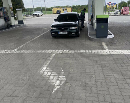 Зеленый Мазда 626, объемом двигателя 2 л и пробегом 282 тыс. км за 3500 $, фото 2 на Automoto.ua