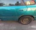 Зеленый Мазда 626, объемом двигателя 1.8 л и пробегом 415 тыс. км за 799 $, фото 1 на Automoto.ua