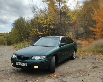 Зеленый Мазда 626, объемом двигателя 2 л и пробегом 228 тыс. км за 2250 $, фото 1 на Automoto.ua