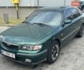 Зеленый Мазда 626, объемом двигателя 2 л и пробегом 311 тыс. км за 2600 $, фото 1 на Automoto.ua