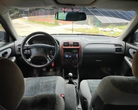 Зеленый Мазда 626, объемом двигателя 2 л и пробегом 228 тыс. км за 2250 $, фото 3 на Automoto.ua