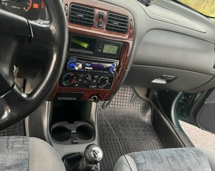 Зеленый Мазда 626, объемом двигателя 2 л и пробегом 3 тыс. км за 2450 $, фото 1 на Automoto.ua