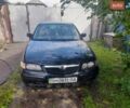 Зеленый Мазда 626, объемом двигателя 2 л и пробегом 387 тыс. км за 2500 $, фото 1 на Automoto.ua