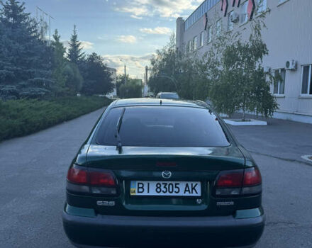 Зелений Мазда 626, об'ємом двигуна 1.8 л та пробігом 342 тис. км за 2900 $, фото 5 на Automoto.ua