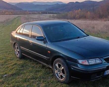 Зеленый Мазда 626, объемом двигателя 1.99 л и пробегом 480 тыс. км за 800 $, фото 2 на Automoto.ua