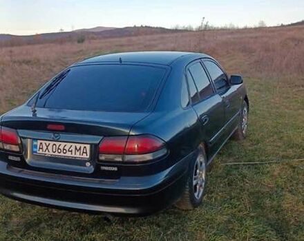 Зеленый Мазда 626, объемом двигателя 1.99 л и пробегом 480 тыс. км за 800 $, фото 1 на Automoto.ua