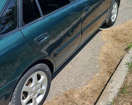 Зеленый Мазда 626, объемом двигателя 2 л и пробегом 330 тыс. км за 2600 $, фото 6 на Automoto.ua