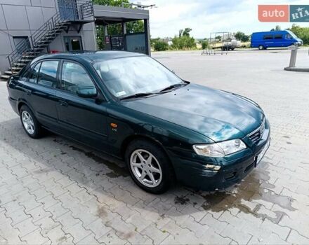 Зеленый Мазда 626, объемом двигателя 2 л и пробегом 235 тыс. км за 3300 $, фото 7 на Automoto.ua