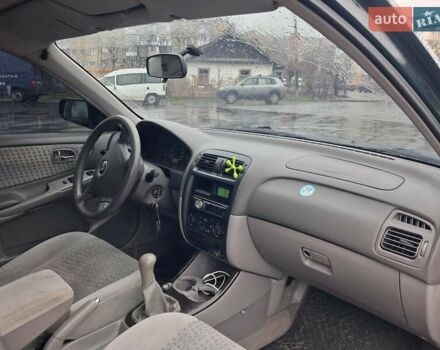 Зелений Мазда 626, об'ємом двигуна 2 л та пробігом 237 тис. км за 3000 $, фото 7 на Automoto.ua