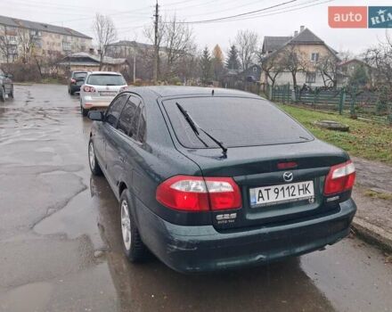 Зелений Мазда 626, об'ємом двигуна 2 л та пробігом 237 тис. км за 3000 $, фото 5 на Automoto.ua