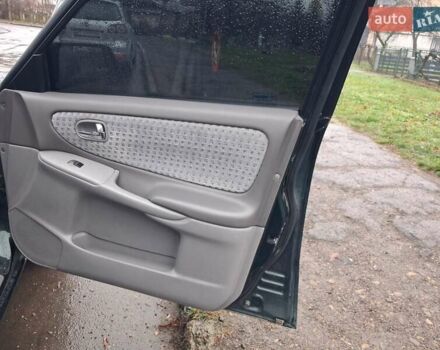 Зелений Мазда 626, об'ємом двигуна 2 л та пробігом 237 тис. км за 3000 $, фото 8 на Automoto.ua