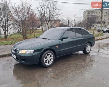 Зелений Мазда 626, об'ємом двигуна 2 л та пробігом 237 тис. км за 3000 $, фото 4 на Automoto.ua