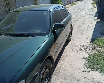 Зеленый Мазда 626, объемом двигателя 2 л и пробегом 280 тыс. км за 1700 $, фото 5 на Automoto.ua