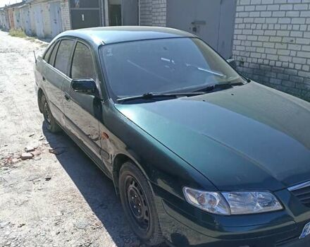 Зеленый Мазда 626, объемом двигателя 2 л и пробегом 280 тыс. км за 1700 $, фото 6 на Automoto.ua