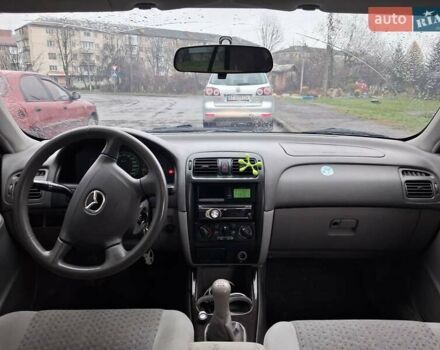 Зелений Мазда 626, об'ємом двигуна 2 л та пробігом 237 тис. км за 3000 $, фото 10 на Automoto.ua