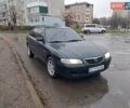 Зелений Мазда 626, об'ємом двигуна 2 л та пробігом 237 тис. км за 3000 $, фото 1 на Automoto.ua