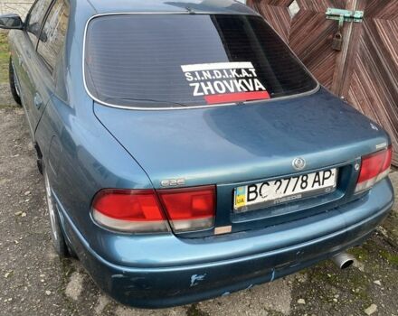 Зеленый Мазда 626, объемом двигателя 2 л и пробегом 470 тыс. км за 900 $, фото 1 на Automoto.ua