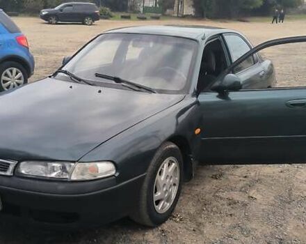 Зелений Мазда 626, об'ємом двигуна 1.8 л та пробігом 455 тис. км за 1752 $, фото 7 на Automoto.ua