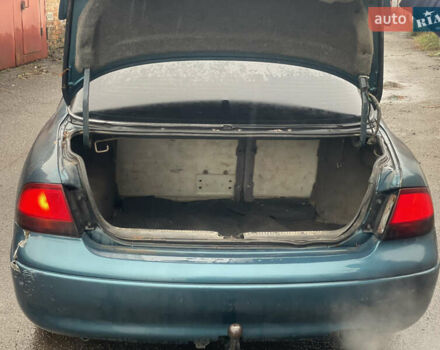Зеленый Мазда 626, объемом двигателя 1.8 л и пробегом 300 тыс. км за 1099 $, фото 7 на Automoto.ua