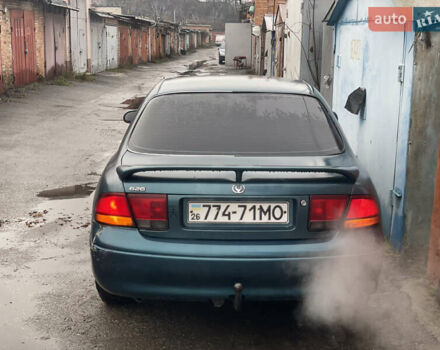 Зеленый Мазда 626, объемом двигателя 1.8 л и пробегом 300 тыс. км за 1099 $, фото 6 на Automoto.ua