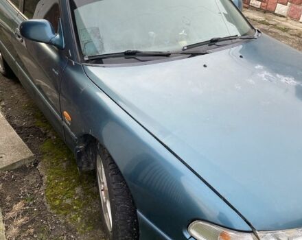 Зеленый Мазда 626, объемом двигателя 2 л и пробегом 470 тыс. км за 900 $, фото 4 на Automoto.ua