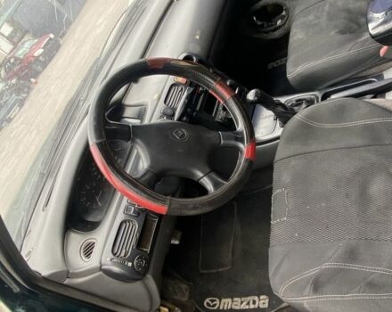 Зелений Мазда 626, об'ємом двигуна 2 л та пробігом 250 тис. км за 800 $, фото 4 на Automoto.ua