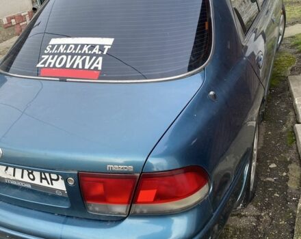Зеленый Мазда 626, объемом двигателя 2 л и пробегом 470 тыс. км за 900 $, фото 5 на Automoto.ua